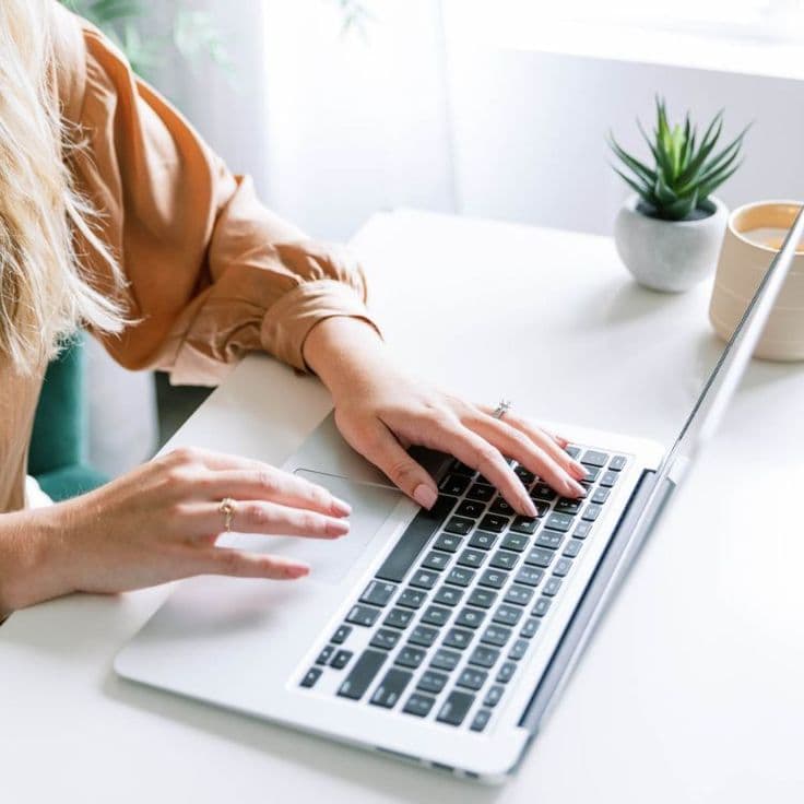 A woman using a notebook