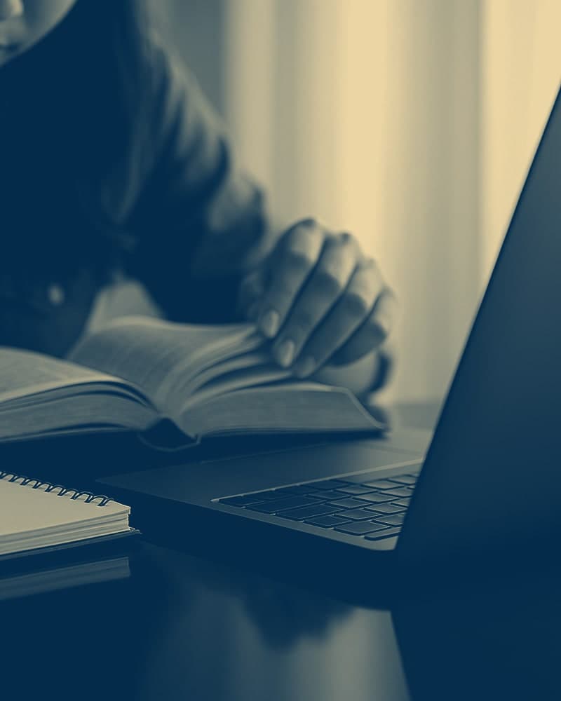 Woman writing in a notebook